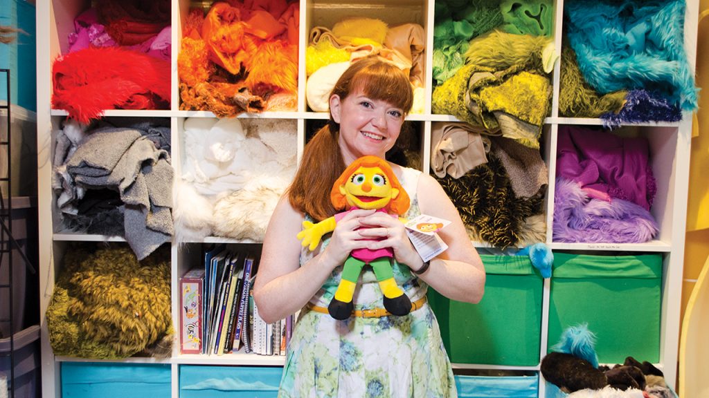 Puppeteer Stacey Gordon with Julia, the character she plays on Sesame Street.