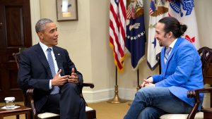 President Barack Obama talks with 'Hamilton' creator Lin-Manuel Miranda.