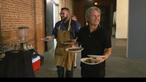 Mark Tarbell lends a hand at a dinner prepared by Hidden Kitchen.