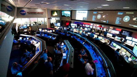 People working at computers at the NASA Space Flight Operations Facility