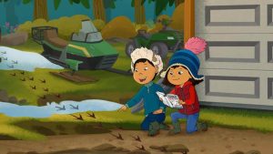 Molly and Tooey examine bird tracks