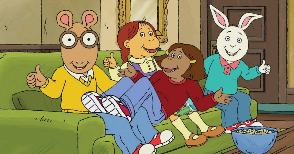 Arthur and his friends gather on the couch with popcorn.