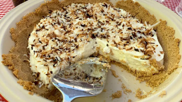 Cream pie with a spatula