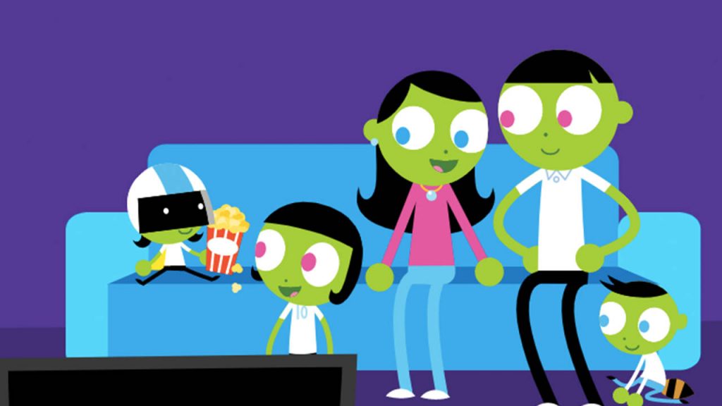 A family of green PBS KIDS characters gather on a blue couch.