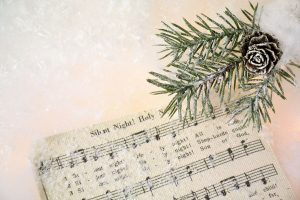 Silent Night score with pine leaf