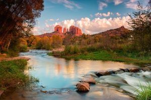 creek with Sedona red rocks in distance