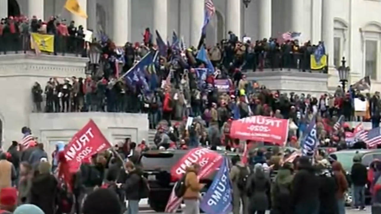 Trump supporters breach the Capitol. Photo courtesy PBS NewsHour.