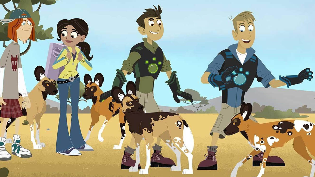 The Wild Kratts team greets a pack of wild dogs.