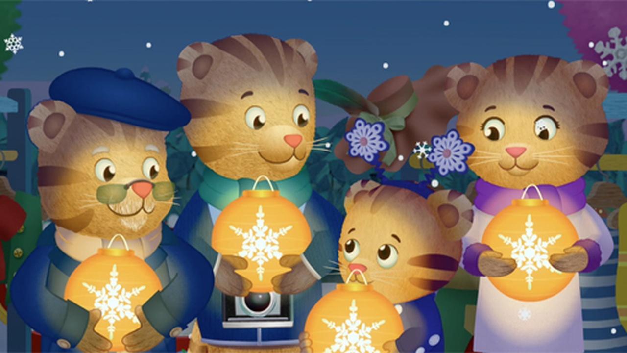 Daniel Tiger and his family prepare to release snowflake lanterns