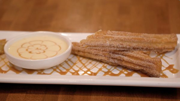 A plate of churros from Cocina Madrigal