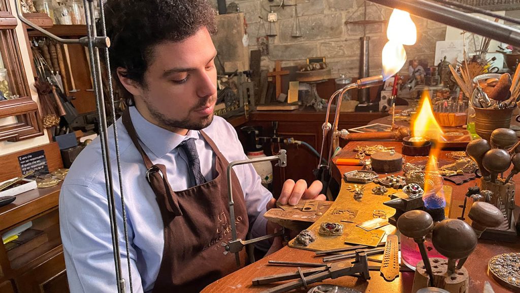 A goldsmith in his workshop in Tuscany.