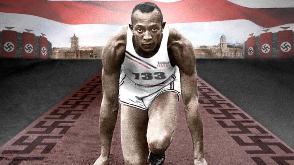 Jesse owens famous athlete olympian on track preparing to run