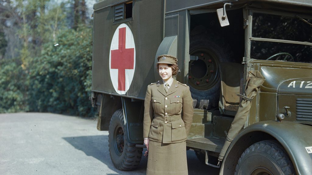 April 1945: Princess Elizabeth, a 2nd Subaltern in the ATS standing in front of an ambulance.