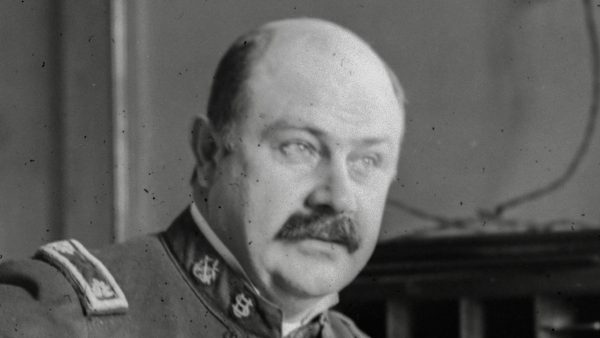 Joseph Kinyoun in uniform at his desk