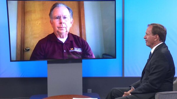 ASU economist speaks virtually to guest host Rick DeBruhl on the set of Arizona Horizon