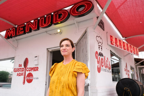 Pati Jinich infront of a Menudo restaurant