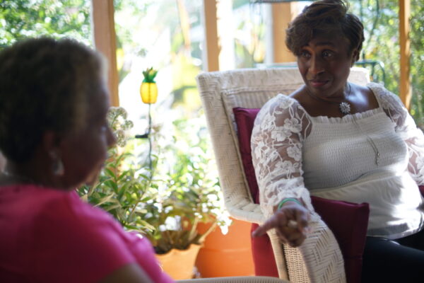 Fonda Bryant sits with her aunt, who helped her when she was thinking about suicide.
