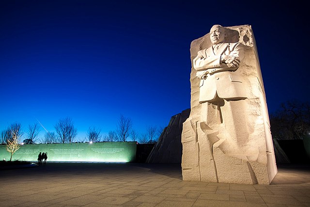 statue of Martin Luther King Jr. at dusk