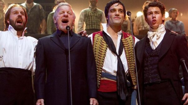 Performers sing during Les Misérables: The Staged Concert