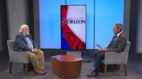 Economist Dale Rogers sitting across AZPBS Horizon host Ted Simons