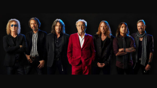 Foreigner band members standing