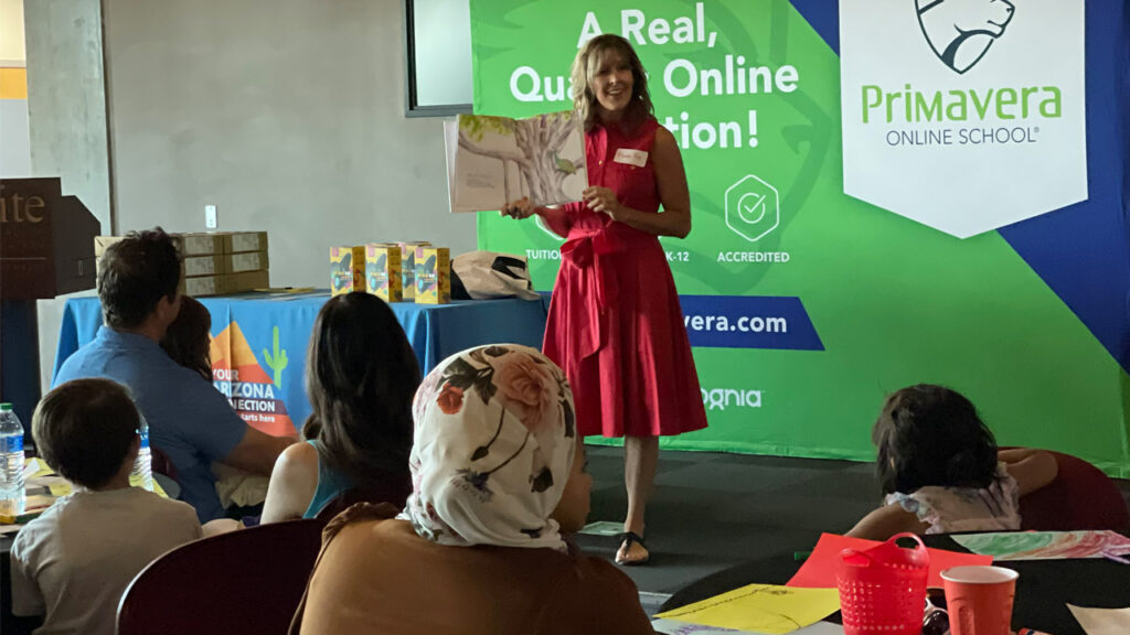 Author Phoebe Fox reading from her book, "Julian Blooms"