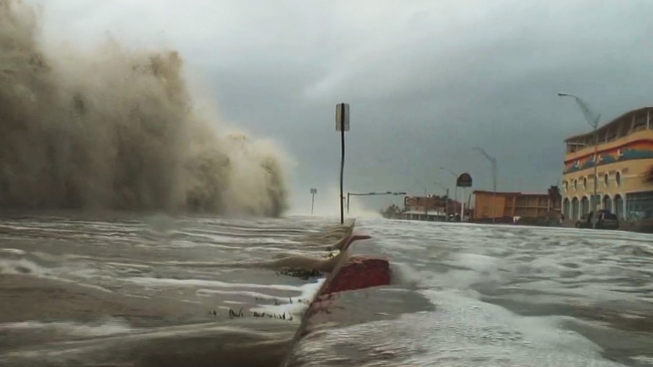 A hurricanes sweeps through a downtown area