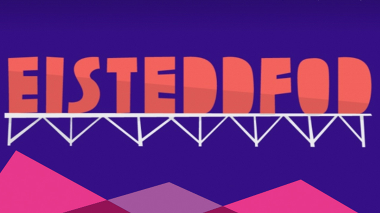 orange letters spelling Eisteddfod on a dark blue background with pink and purple mountains below