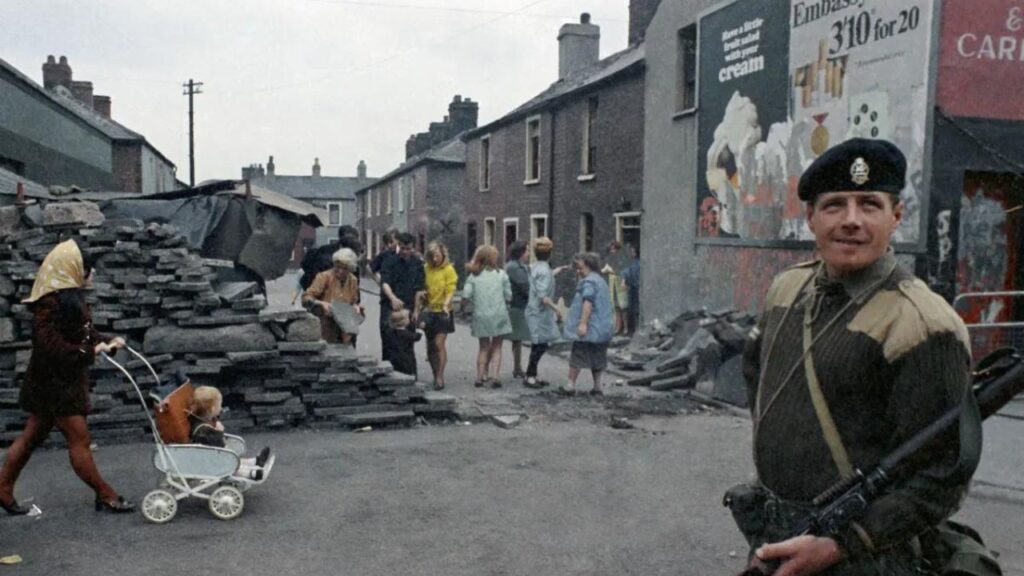 A soldier holds a gun from Once Upon a Time in Northern Ireland