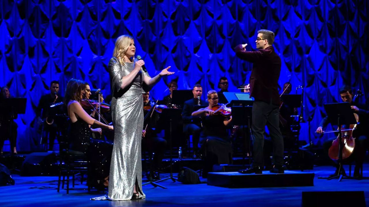Megan Hilty sings on stage on broadway's brightest lights
