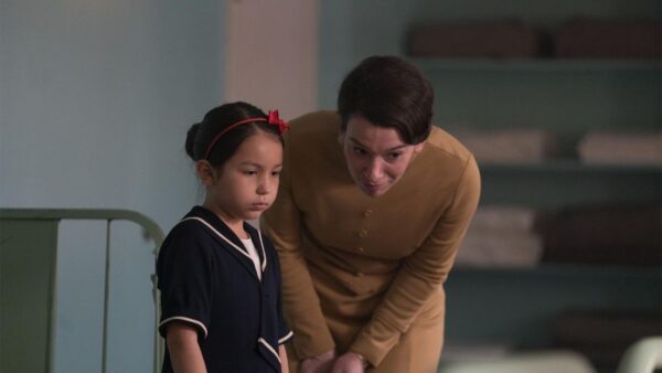 A young Native American girl is adopted into a white family