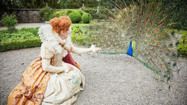 Queen Elizabeth with a peacock