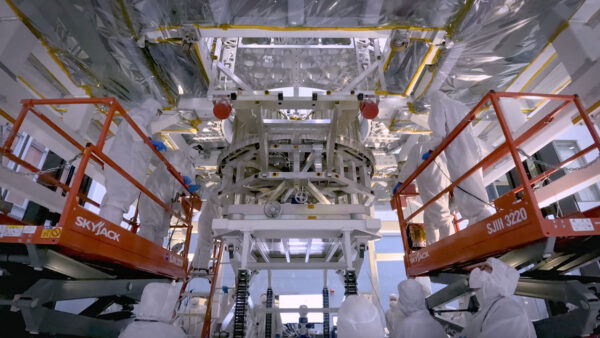 A spacecraft being constructed in a clean laboratory setting