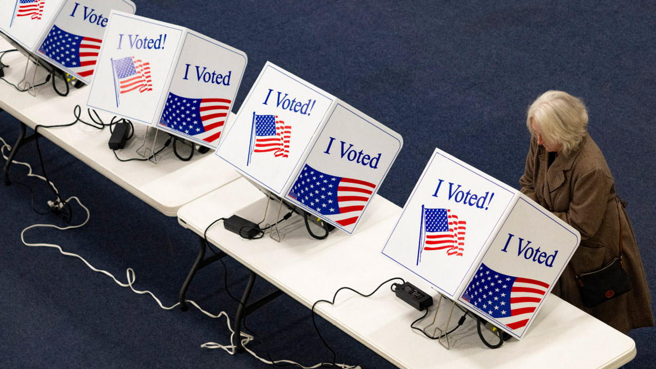 Voting booths sitting on a table in a row