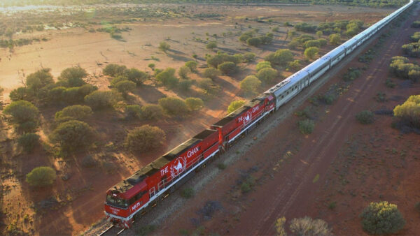 A red train passing through Australia