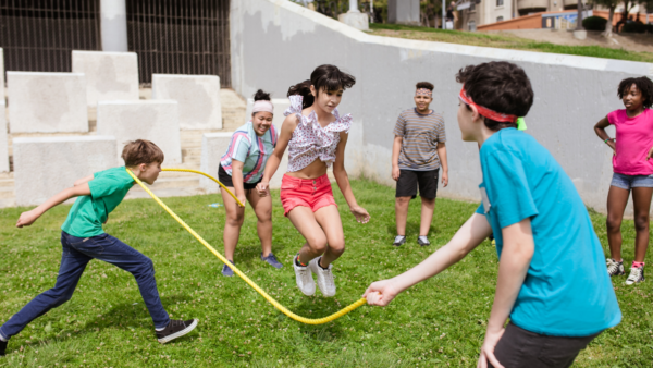 A group of kids jump roping