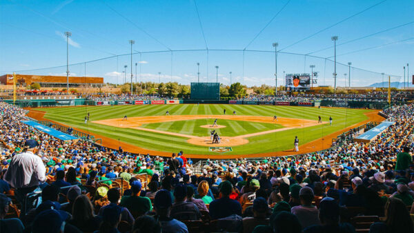 An energetic baseball stadium filled with spectators enjoying the game.