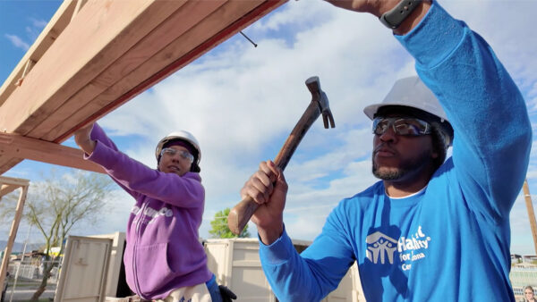 Two trainees in Habitat For Humanity’s new construction training program