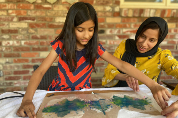 A mom and daughter make northern light art