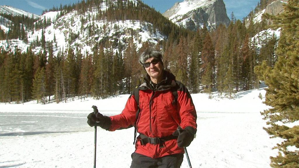 Nick Molle hiking in the snow