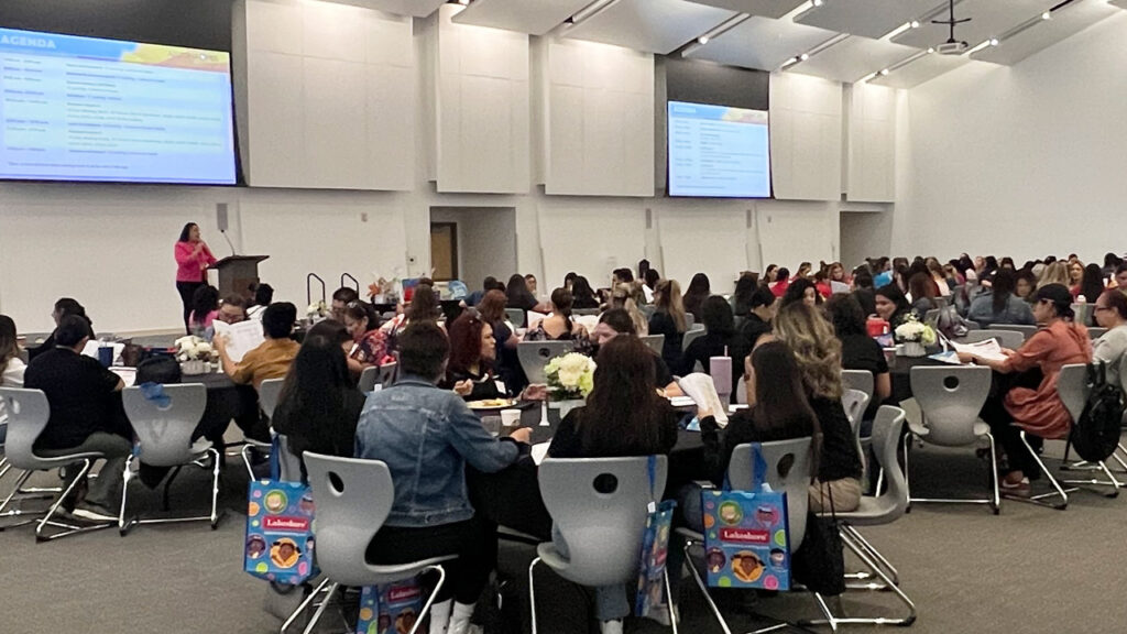 A group of early childhood educators gathers for a conference