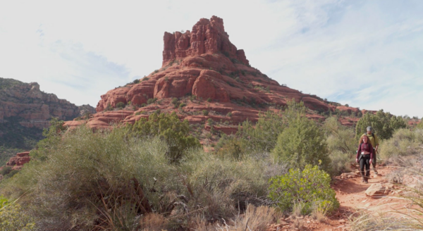 Jayarr and a guest hiking an Arizona trail