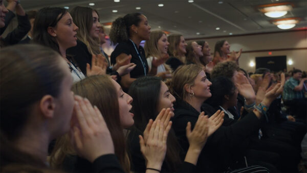 A crowd cheering