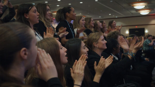 A group of women clapping