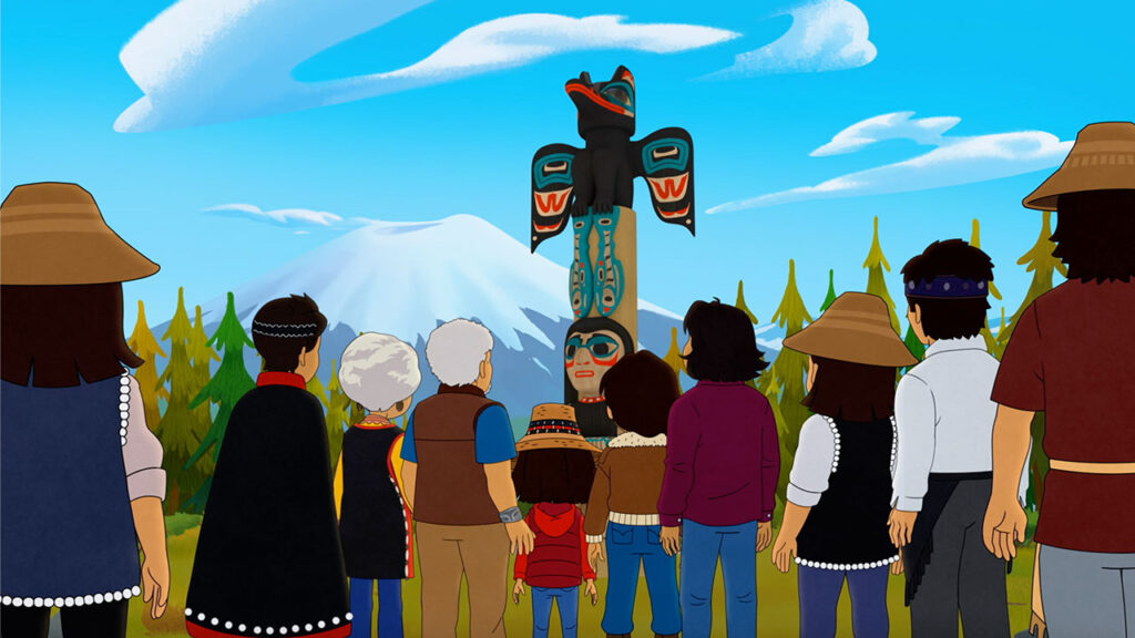 A diverse group of individuals gathered around a tall totem pole, engaged in conversation and observation.