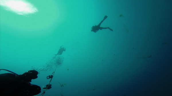 Underwater archaeology being conducted by scuba divers