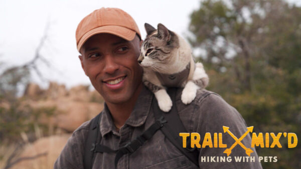 Jayarr Steiner with a cat on the trail