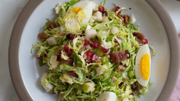 Crunchy Shaved Brussels Sprouts Salad with Pear and Pomegranate