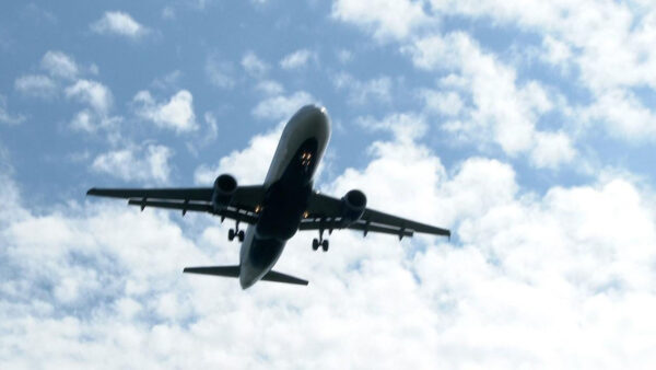 An airplane flies overhead