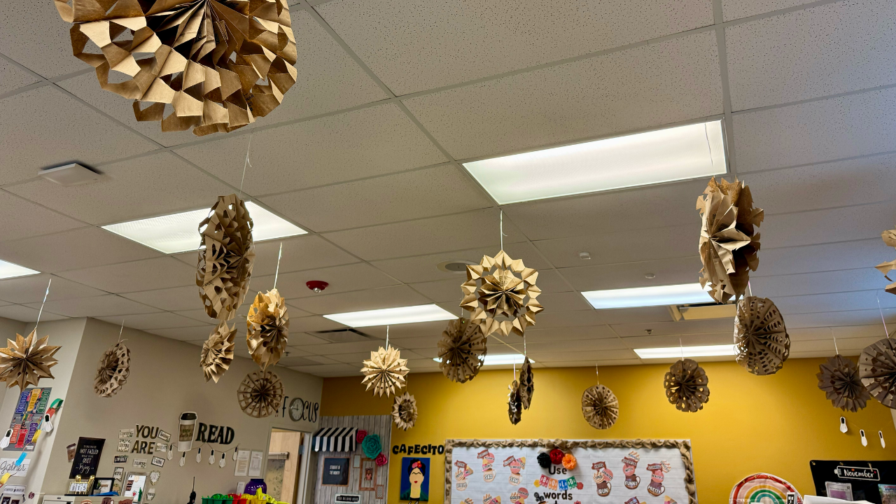 Paper snowflakes hanging from the ceiling